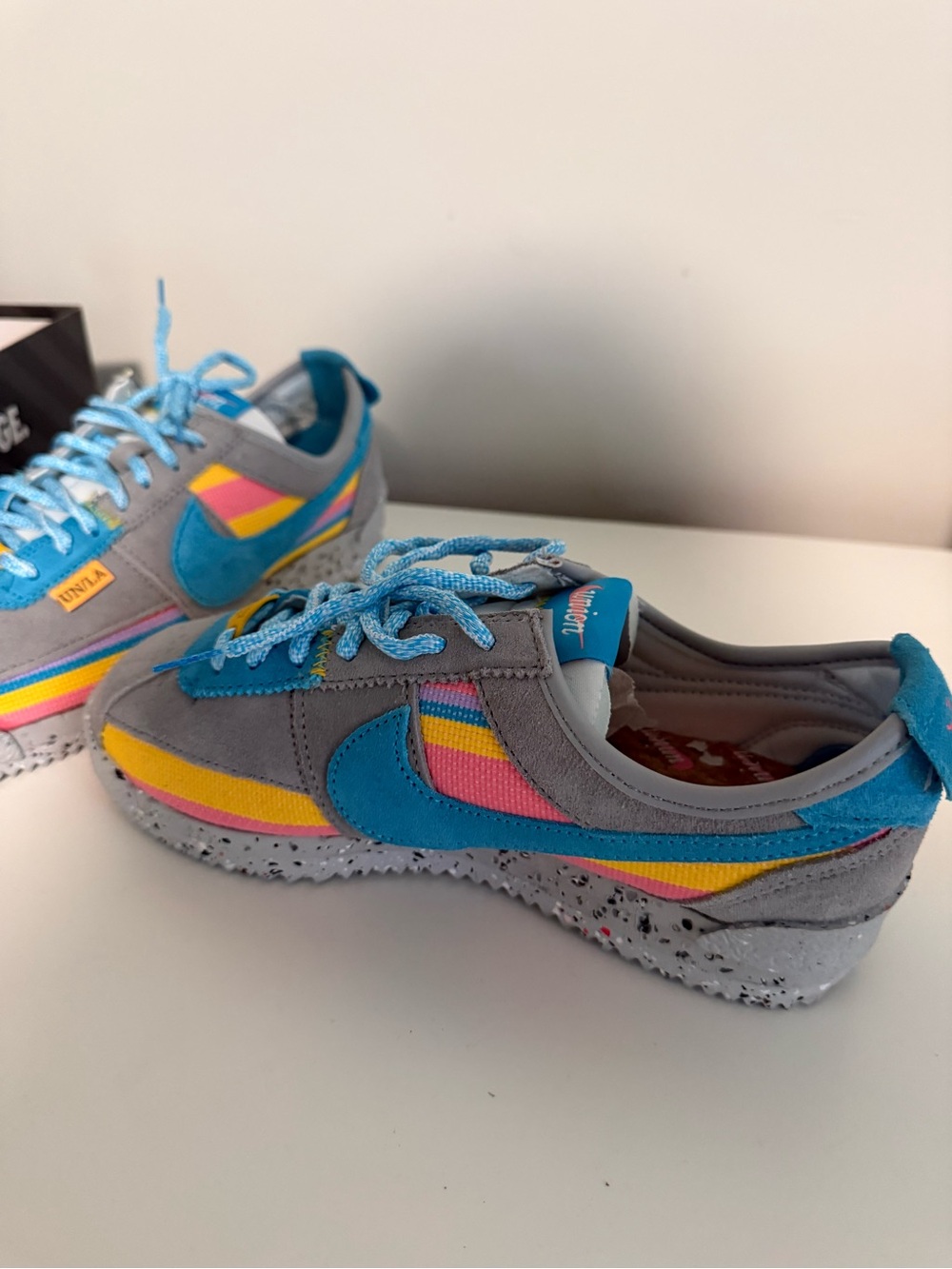 Nike Women's Gray Sneakers with Blue, Pink & Yellow Accents